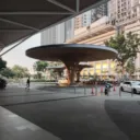 A rounded, modern looking rooftop outside with sunshine pouring at the side