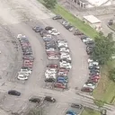 Cars parking in a curved carpark